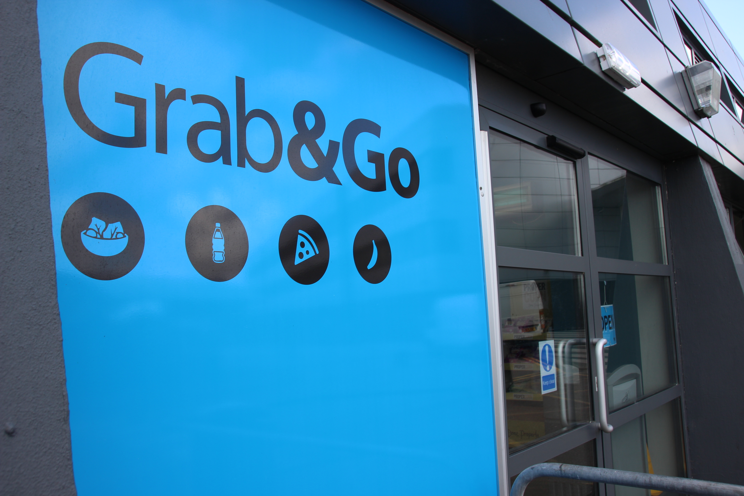 Images showing Grab and Go name and infographics on a blue background