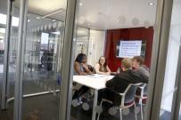 Group of students using Library pod